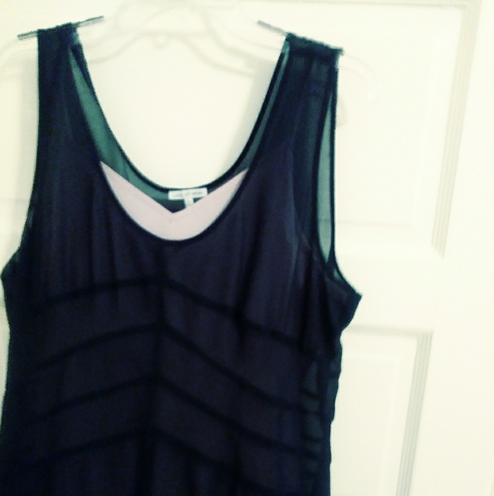 Very shear black dress with cream slip